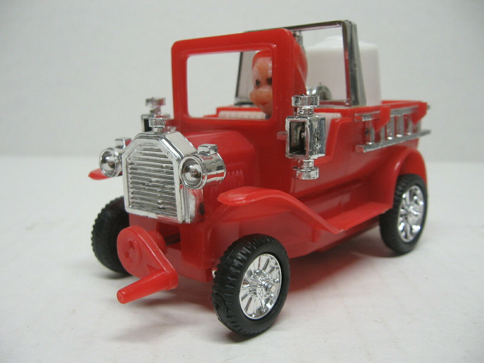 Unbranded Red Plastic Friction Toy Fire Truck With Driver - Wacky Front Wheels